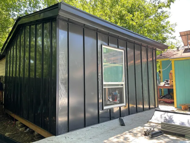 Black standing seam metal wall panels for Metal Roof Installation in Sanger