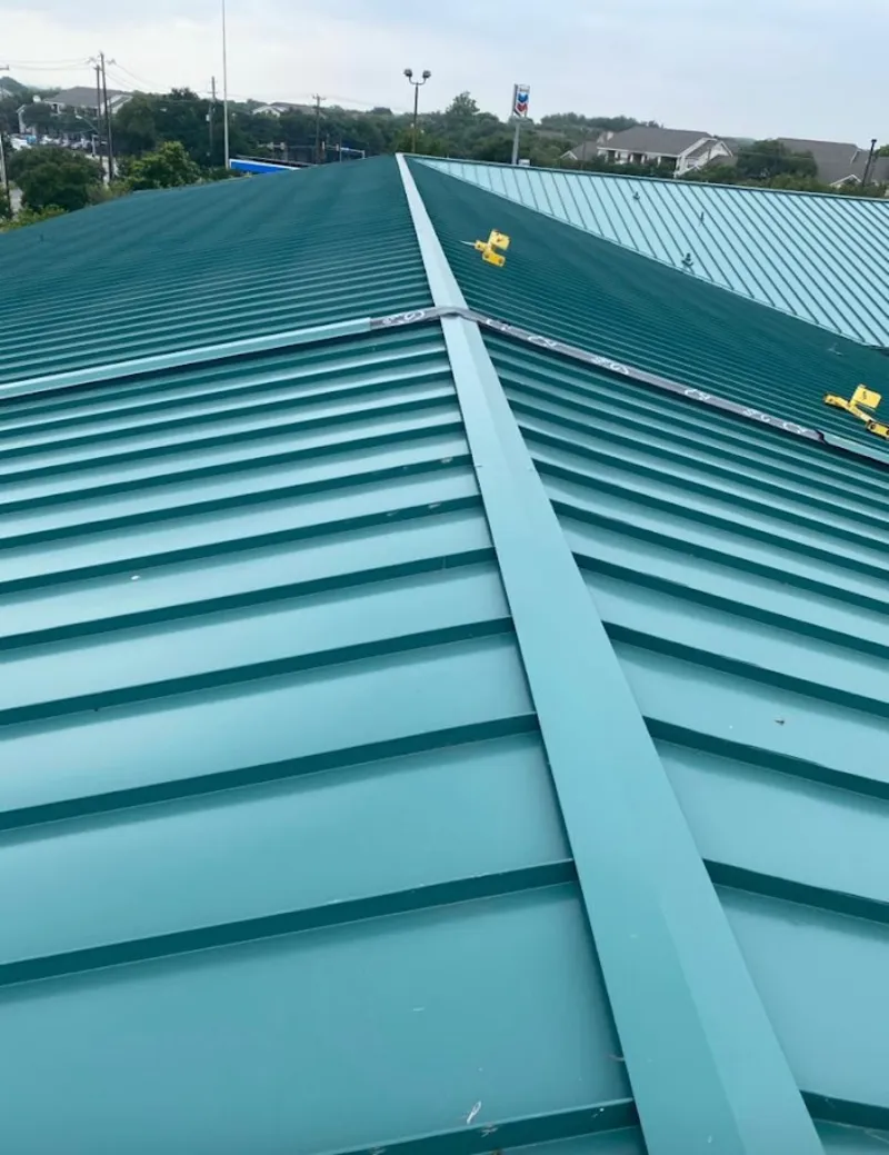 Green commercial metal roof ridge and valley for Metal Roof Repair in Sanger
